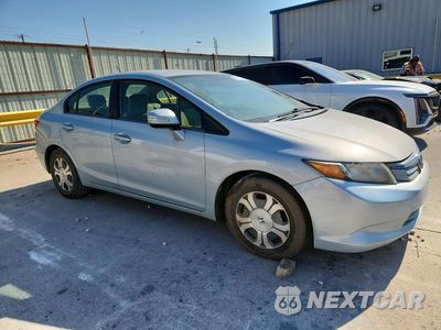 Czwarte zdjęcie samochodu z boku: 2012 HONDA CIVIC HYBRID VIN:JHMFB4F26CS008325 - miniatura