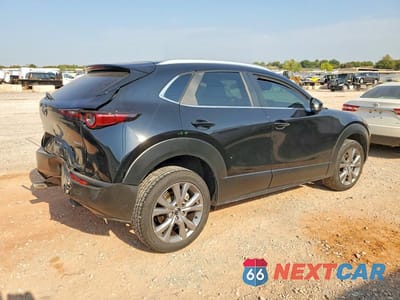 Trzecie zdjęcie samochodu z tyłu: 2023 MAZDA CX-30 PREFERRED VIN:3MVDMBCM1PM555058 - miniatura