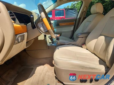 Zdjęcie 7 z 12 samochodu: 2007 LINCOLN MKZ VIN:3LNHM28T57R629678 - miniatura