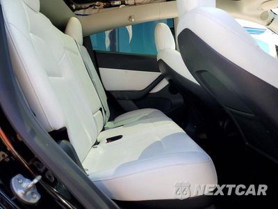 Zdjęcie 10 z 12 samochodu: 2022 TESLA MODEL Y VIN:7SAYGDEE5NF433898 - miniatura