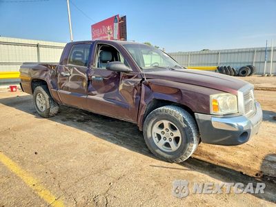 Czwarte zdjęcie samochodu z boku: 2005 DODGE DAKOTA QUAD SLT VIN:1D7HW48N85S106707 - miniatura