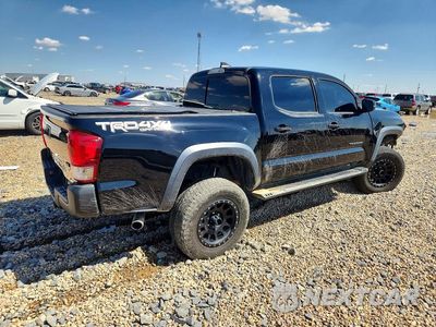 Trzecie zdjęcie samochodu z tyłu: 2017 TOYOTA TACOMA TRD OFF-ROAD VIN:5TFCZ5AN6HX052682 - miniatura