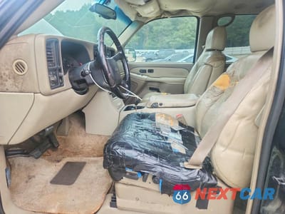 Zdjęcie 7 z 12 samochodu: 2002 CHEVROLET SUBURBAN C1500 VIN:3GNEC16Z02G202111 - miniatura
