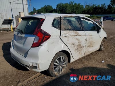 Trzecie zdjęcie samochodu z tyłu: 2020 HONDA FIT EX VIN:3HGGK5H88LM718883 - miniatura