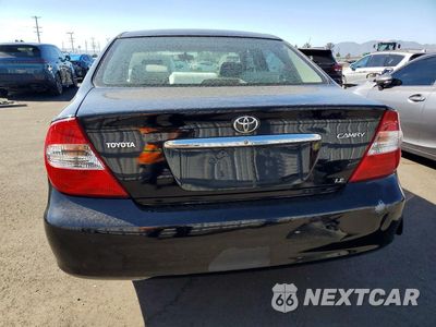 Zdjęcie 6 z 12 samochodu: 2002 TOYOTA CAMRY LE VIN:JTDBE32K320056835 - miniatura