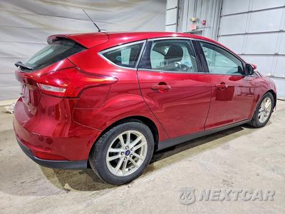 Trzecie zdjęcie samochodu z tyłu: 2016 FORD FOCUS SE VIN:1FADP3K27GL223650 - miniatura