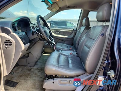 Zdjęcie 7 z 13 samochodu: 2004 HONDA ODYSSEY EXL VIN:5FNRL18064B037635 - miniatura