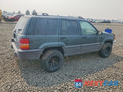 Trzecie zdjęcie samochodu z tyłu: 1995 JEEP GRAND CHEROKEE LAREDO VIN:1J4GZ58S4SC649397 - miniatura