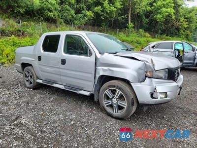 Czwarte zdjęcie samochodu z boku: 2014 HONDA RIDGELINE SPORT VIN:5FPYK1F75EB004097 - miniatura
