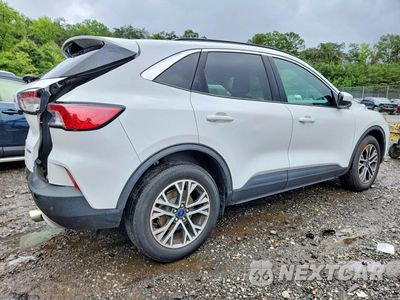 Trzecie zdjęcie samochodu z tyłu: 2020 FORD ESCAPE SEL VIN:1FMCU9H68LUA94667 - miniatura