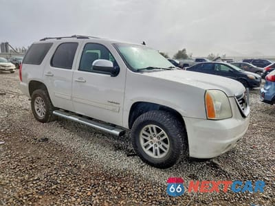Czwarte zdjęcie samochodu z boku: 2012 GMC YUKON SLE VIN:1GKS2AE0XCR303762 - miniatura