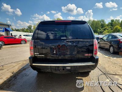 Zdjęcie 6 z 13 samochodu: 2011 GMC YUKON DENALI VIN:1GKS2EEFXBR107654 - miniatura