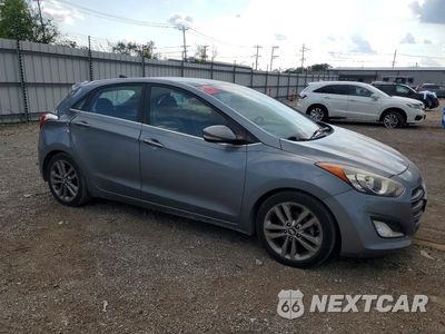 Czwarte zdjęcie samochodu z boku: 2016 HYUNDAI ELANTRA GT BASE VIN:KMHD35LH9GU310069 - miniatura