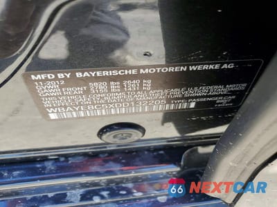 Zdjęcie 13 z 13 samochodu: 2013 BMW 750 LI VIN:WBAYE8C5XDD132205 - miniatura