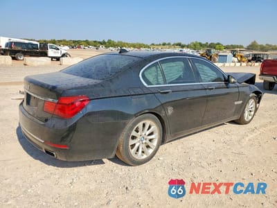 Trzecie zdjęcie samochodu z tyłu: 2014 BMW 740 I VIN:WBAYA6C59ED144430 - miniatura
