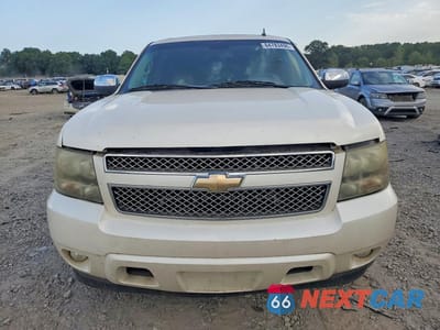 Piąte zdjęcie samochodu w środku: 2010 CHEVROLET SUBURBAN C1500 LTZ VIN:1GNUCKE02AR134364 - miniatura