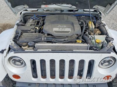 Zdjęcie 12 z 14 samochodu: 2013 JEEP WRANGLER UNLIMITED SAHARA VIN:1C4BJWEG9DL668110 - miniatura