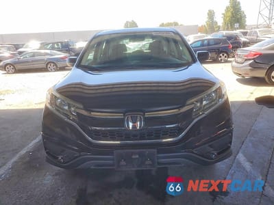 Piąte zdjęcie samochodu w środku: 2016 HONDA CR-V LX VIN:2HKRM3H38GH507219 - miniatura