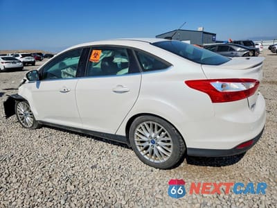 Drugie zdjęcie samochodu z przodu: 2013 FORD FOCUS TITANIUM VIN:1FADP3J25DL263593 - miniatura