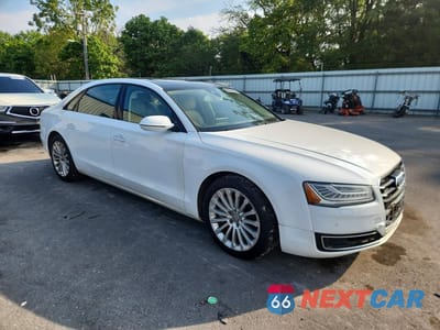 Czwarte zdjęcie samochodu z boku: 2016 AUDI A8 L QUATTRO VIN:WAU34AFD2GN007754 - miniatura