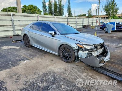 Czwarte zdjęcie samochodu z boku: 2021 TOYOTA CAMRY XSE VIN:4T1K61BK2MU037329 - miniatura