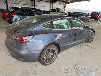 Trzecie zdjęcie samochodu z tyłu: 2020 TESLA MODEL 3 VIN:5YJ3E1EAXLF804821 - miniatura