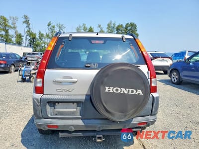 Zdjęcie 6 z 13 samochodu: 2002 HONDA CR-V LX VIN:JHLRD68432C009642 - miniatura