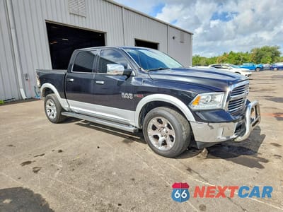 Czwarte zdjęcie samochodu z boku: 2016 RAM 1500 LARAMIE VIN:1C6RR7NM9GS338018 - miniatura