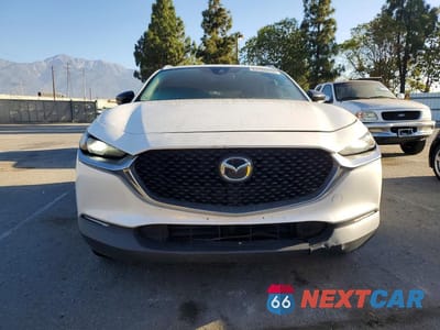 Piąte zdjęcie samochodu w środku: 2021 MAZDA CX-30 PREMIUM VIN:3MVDMBDY1MM305896 - miniatura