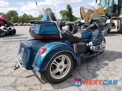 Trzecie zdjęcie samochodu z tyłu: 1994 HONDA GL1500 SE VIN:1HFSC2237RA603088 - miniatura