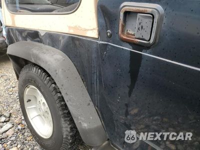 Zdjęcie 9 z 10 samochodu: 2000 JEEP WRANGLER / VIN:1J4FA4969YP739968 - miniatura