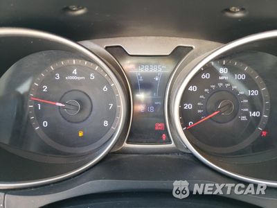 Zdjęcie 9 z 12 samochodu: 2012 HYUNDAI VELOSTER VIN:KMHTC6AD2CU025158 - miniatura