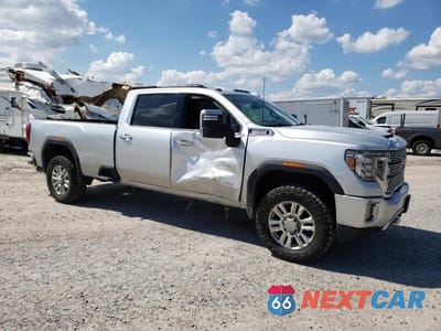 Czwarte zdjęcie samochodu z boku: 2020 GMC SIERRA K3500 DENALI VIN:1GT49WEY4LF149232 - miniatura