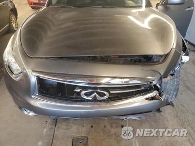 Zdjęcie 11 z 12 samochodu: 2015 INFINITI QX70 VIN:JN8CS1MW1FM482477 - miniatura