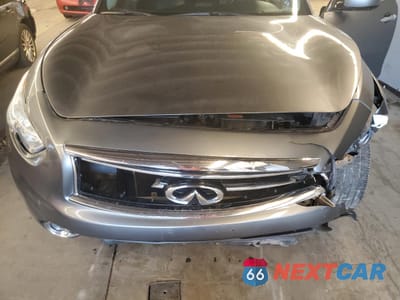 Zdjęcie 11 z 12 samochodu: 2015 INFINITI QX70 VIN:JN8CS1MW1FM482477 - miniatura