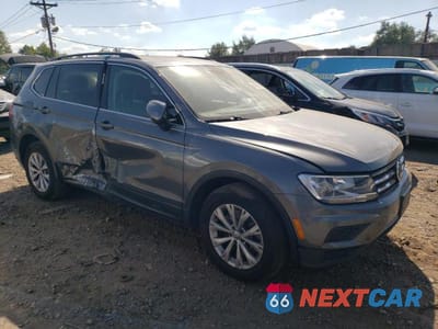 Czwarte zdjęcie samochodu z boku: 2019 VOLKSWAGEN TIGUAN SE VIN:3VV2B7AX7KM090837 - miniatura