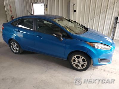 Czwarte zdjęcie samochodu z boku: 2014 FORD FIESTA SE VIN:3FADP4BJ9EM211671 - miniatura