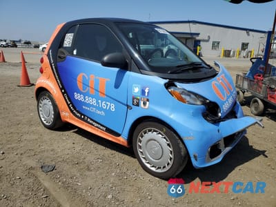 Czwarte zdjęcie samochodu z boku: 2013 SMART FORTWO PURE VIN:WMEEJ3BA7DK630989 - miniatura