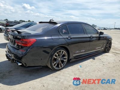 Trzecie zdjęcie samochodu z tyłu: 2019 BMW 740 I VIN:WBA7E2C59KB217957 - miniatura