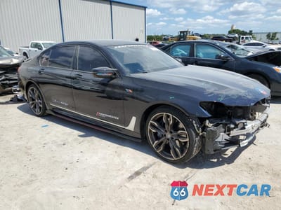 Czwarte zdjęcie samochodu z boku: 2019 BMW 740 I VIN:WBA7E2C59KB217957 - miniatura