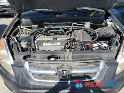 Zdjęcie 11 z 12 samochodu: 2002 HONDA CR-V LX VIN:JHLRD78442C070407 - miniatura