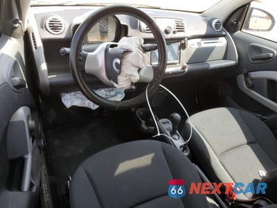 Zdjęcie 8 z 14 samochodu: 2013 SMART FORTWO PURE VIN:WMEEJ3BA7DK630989 - miniatura