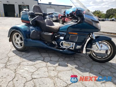 Czwarte zdjęcie samochodu z boku: 1994 HONDA GL1500 SE VIN:1HFSC2237RA603088 - miniatura