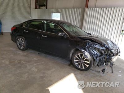 Czwarte zdjęcie samochodu z boku: 2017 NISSAN ALTIMA 2.5 VIN:1N4AL3AP2HC193373 - miniatura