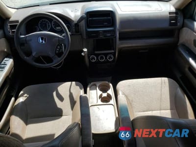 Zdjęcie 8 z 12 samochodu: 2002 HONDA CR-V LX VIN:JHLRD78442C070407 - miniatura