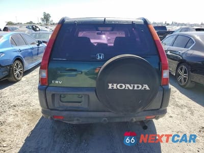 Zdjęcie 6 z 12 samochodu: 2002 HONDA CR-V LX VIN:JHLRD78442C070407 - miniatura