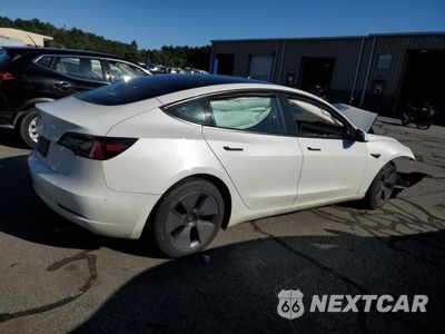 Trzecie zdjęcie samochodu z tyłu: 2023 TESLA MODEL 3 VIN:5YJ3E1EA1PF473407 - miniatura