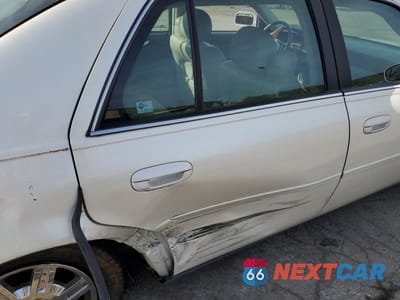 Zdjęcie 11 z 14 samochodu: 2003 CADILLAC DEVILLE VIN:1G6KD54Y03U232818 - miniatura