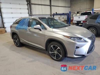 Czwarte zdjęcie samochodu z boku: 2018 LEXUS RX 450H BASE VIN:2T2BGMCA1JC024570 - miniatura