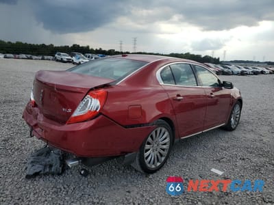 Trzecie zdjęcie samochodu z tyłu: 2013 LINCOLN MKS VIN:1LNHL9DK0DG615344 - miniatura